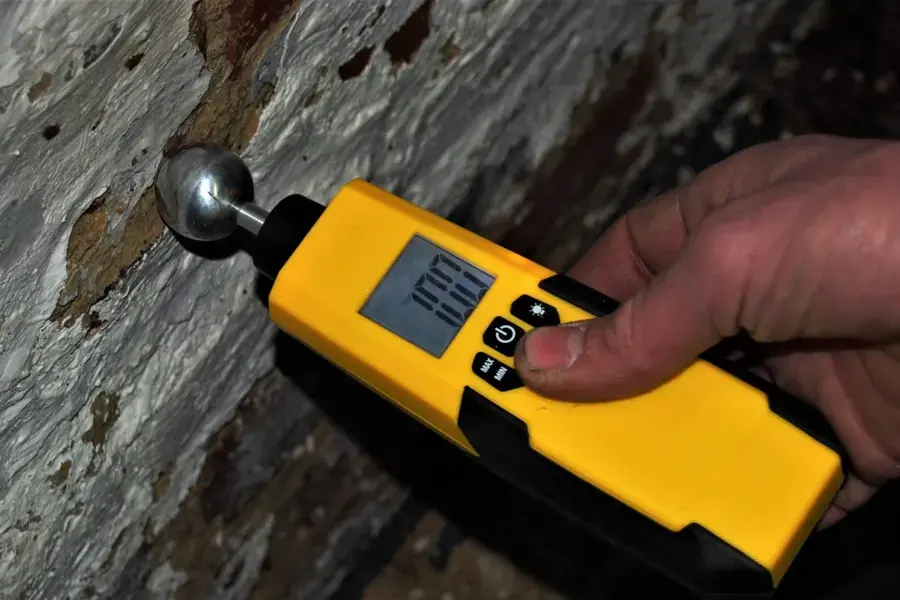 Pin moisture meter reading taken during a Miami Beach water damage inspection